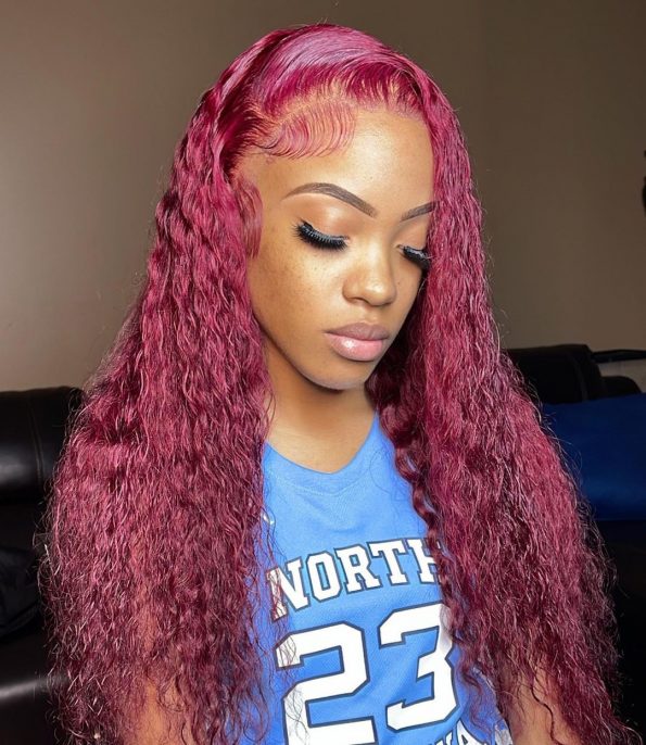 Close-up of 6x5 lace closure hairline on burgundy deep wave wig